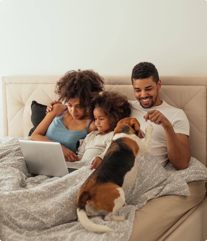 Family in bed snuggled up while their boiler works thanks to boiler repair services in Auburn, IN