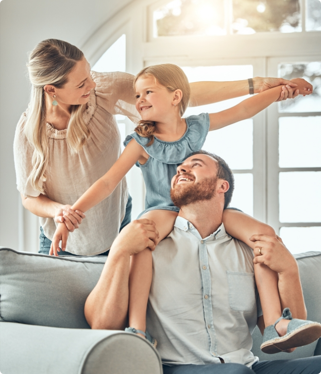 Family playing in their comfortable house because of their AC Tune-Up