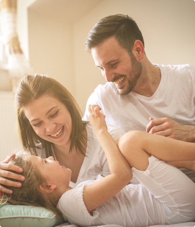 Man woman and child all happy after their boiler installation in Kendallville, IN