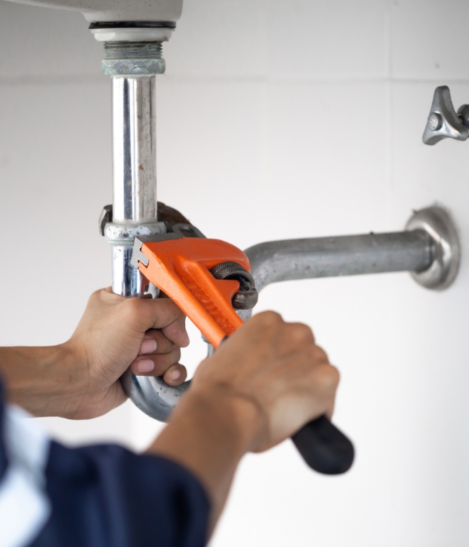 A hand view of technician doing Emergency Plumbing in Kendallville, IN
